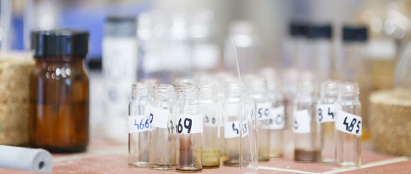Small sample bottles on laboratory table